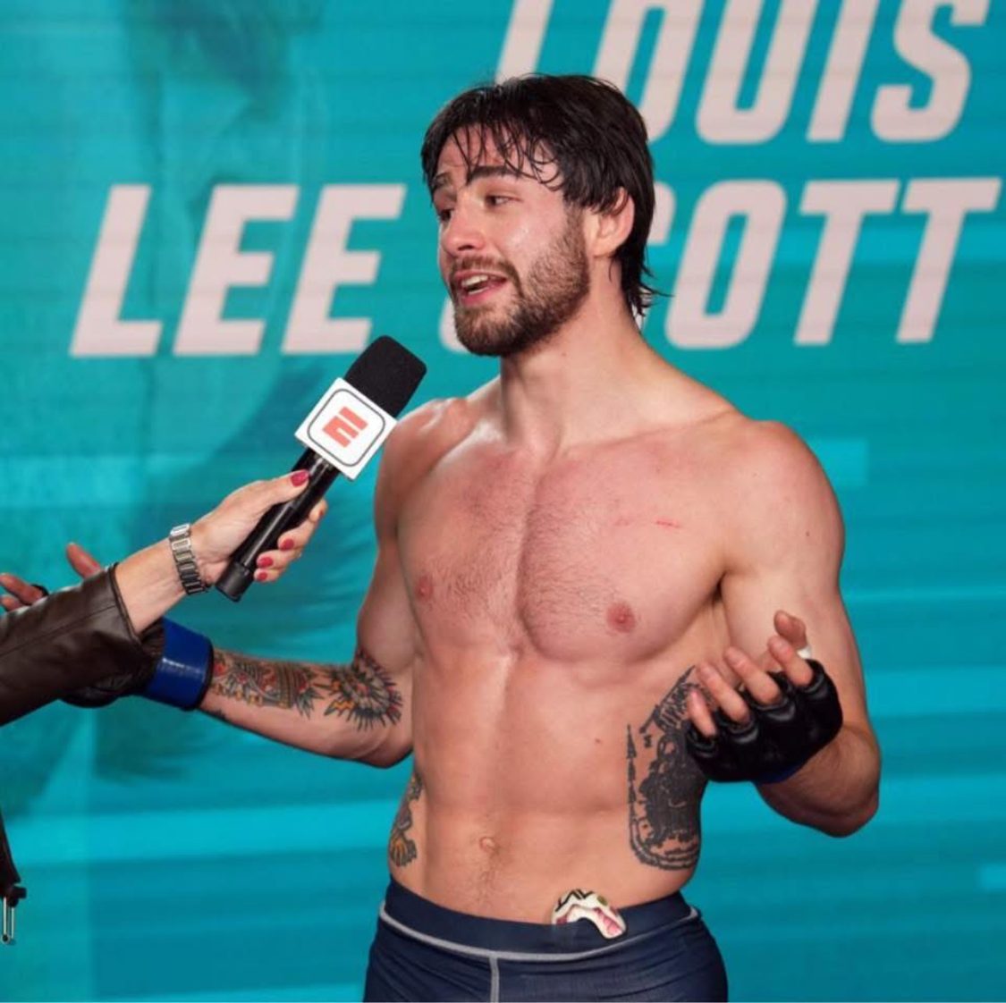 Louis Lee Scott giving a post-fight interview