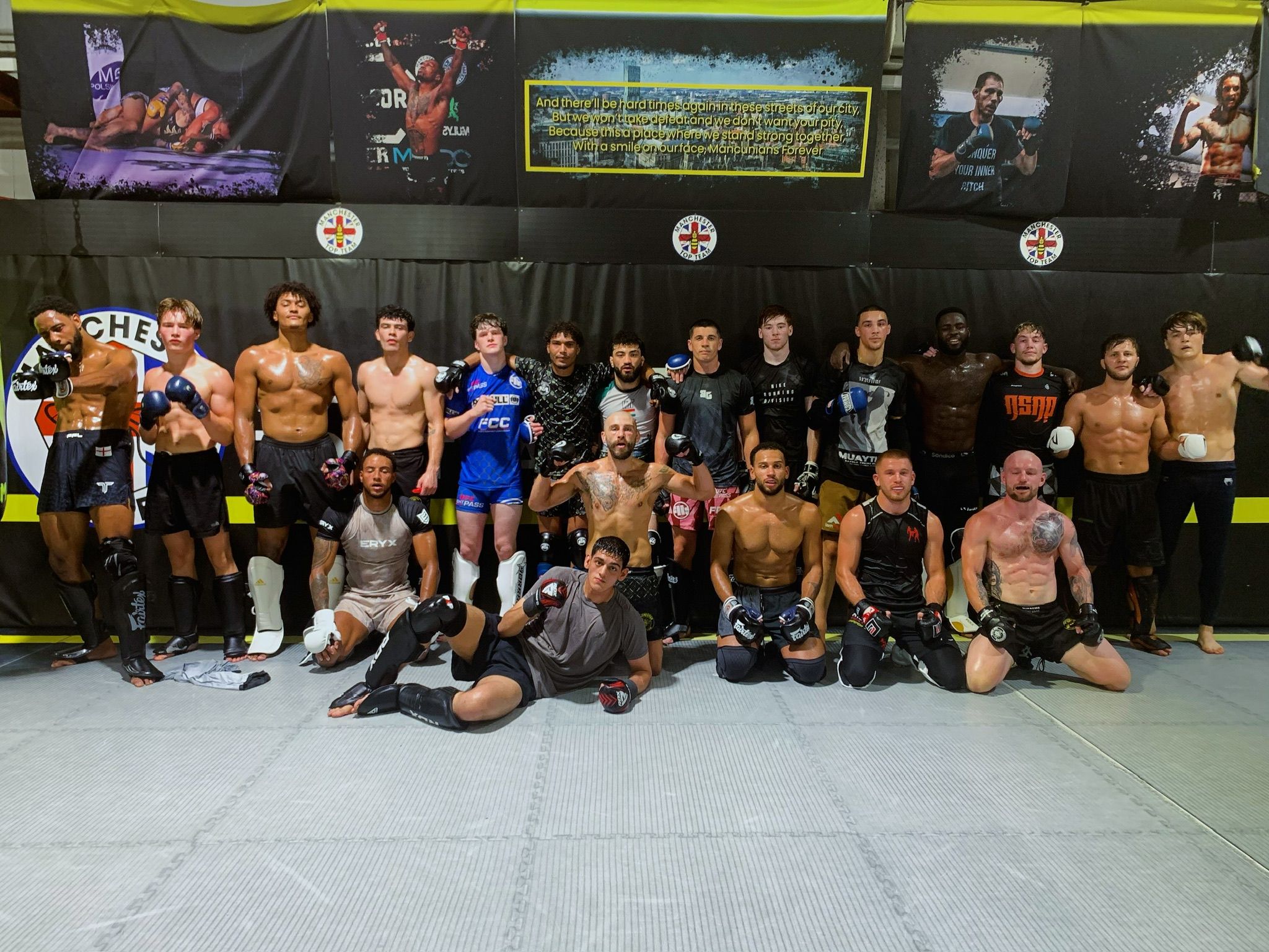 The Manchester Top Team fight team lined up on the mats